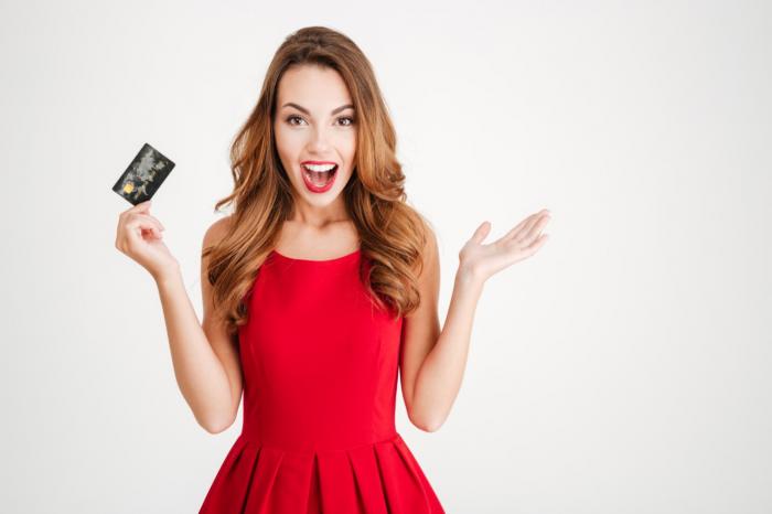 Woman holding a credit card