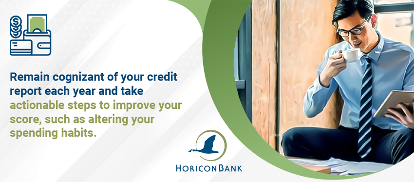 Remain cognizant of your credit report each year and take actionable steps to improve your score, such as altering your spending habits. 